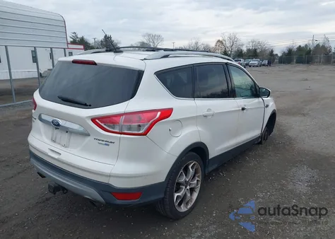 2016 Ford Escape Titanium z USA, uszkodzony, nr VIN 1FMCU9J92GUB31741